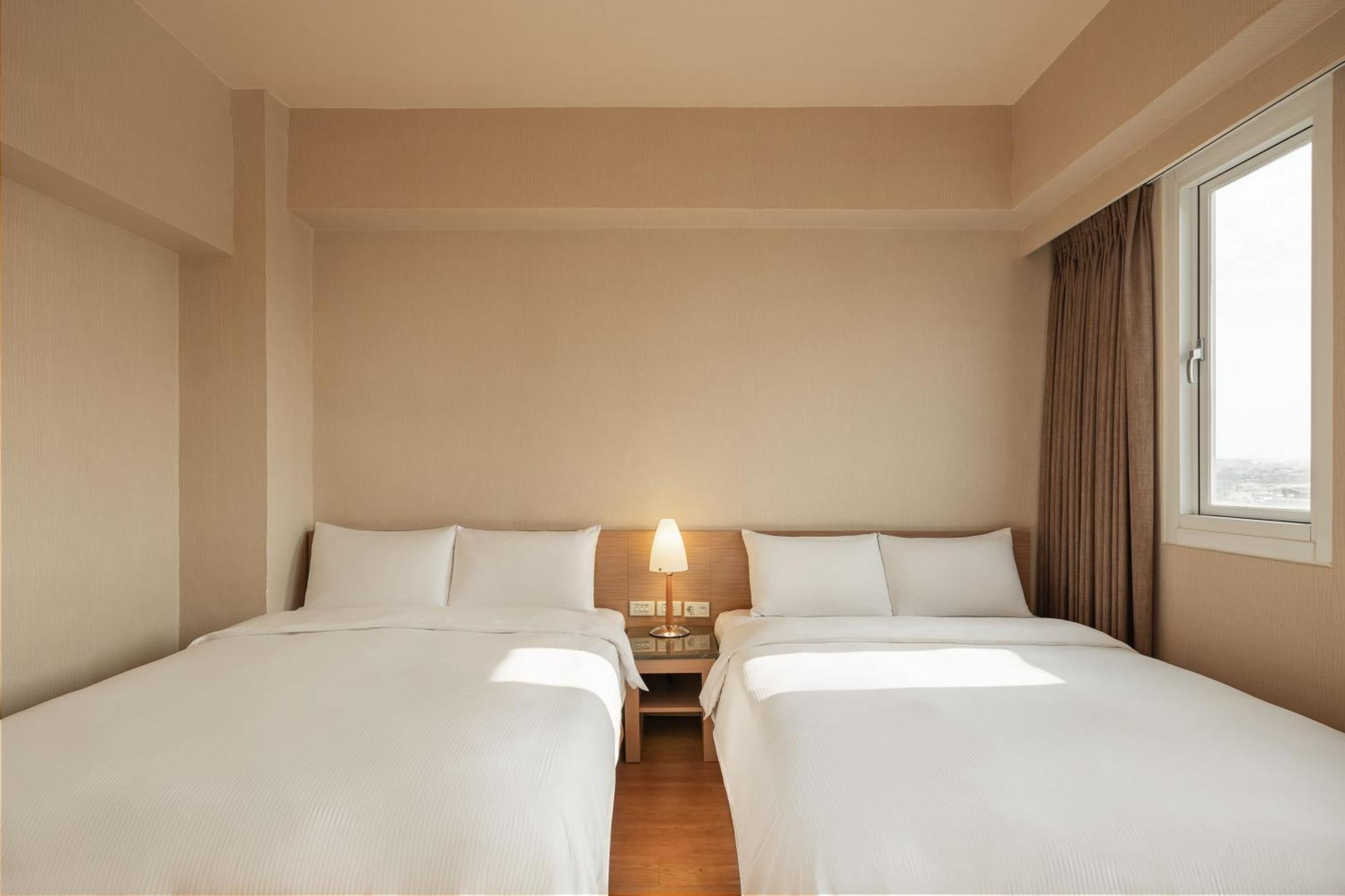 Kindness Hotel Wu-Jia Kaohsiung Quarto foto